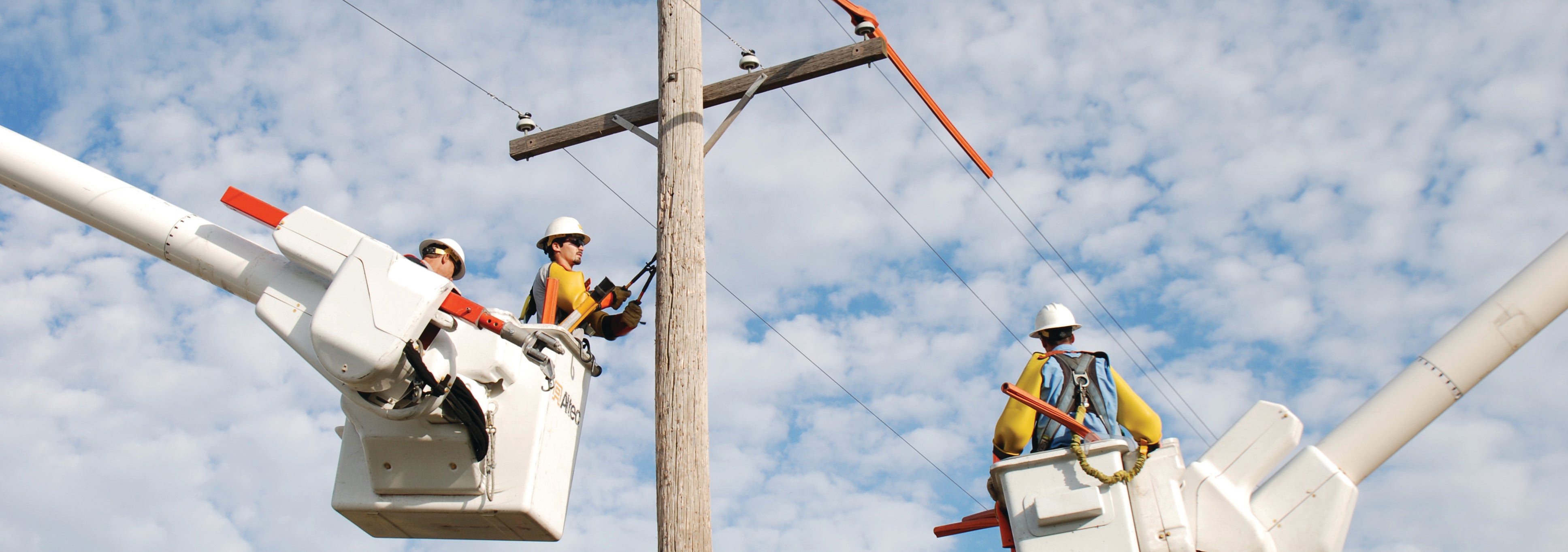 Lineman working on a pole Lineman working on a pole